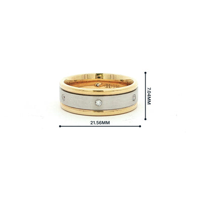 .09ct Round Brilliant cut Natural Diamond set two tone with a 9ct white gold satin center