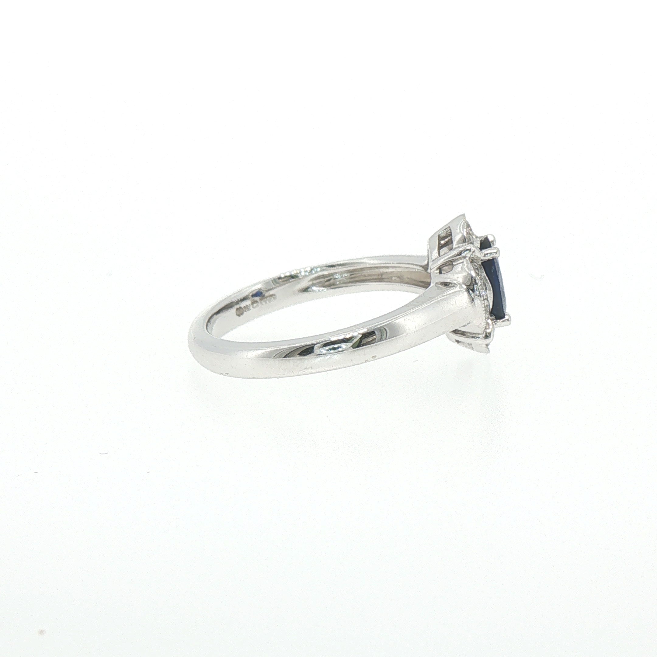 0.81ct Oval Sapphire & 0.15ct Natural Diamond Halo Cluster Ring in 18ct White Gold
