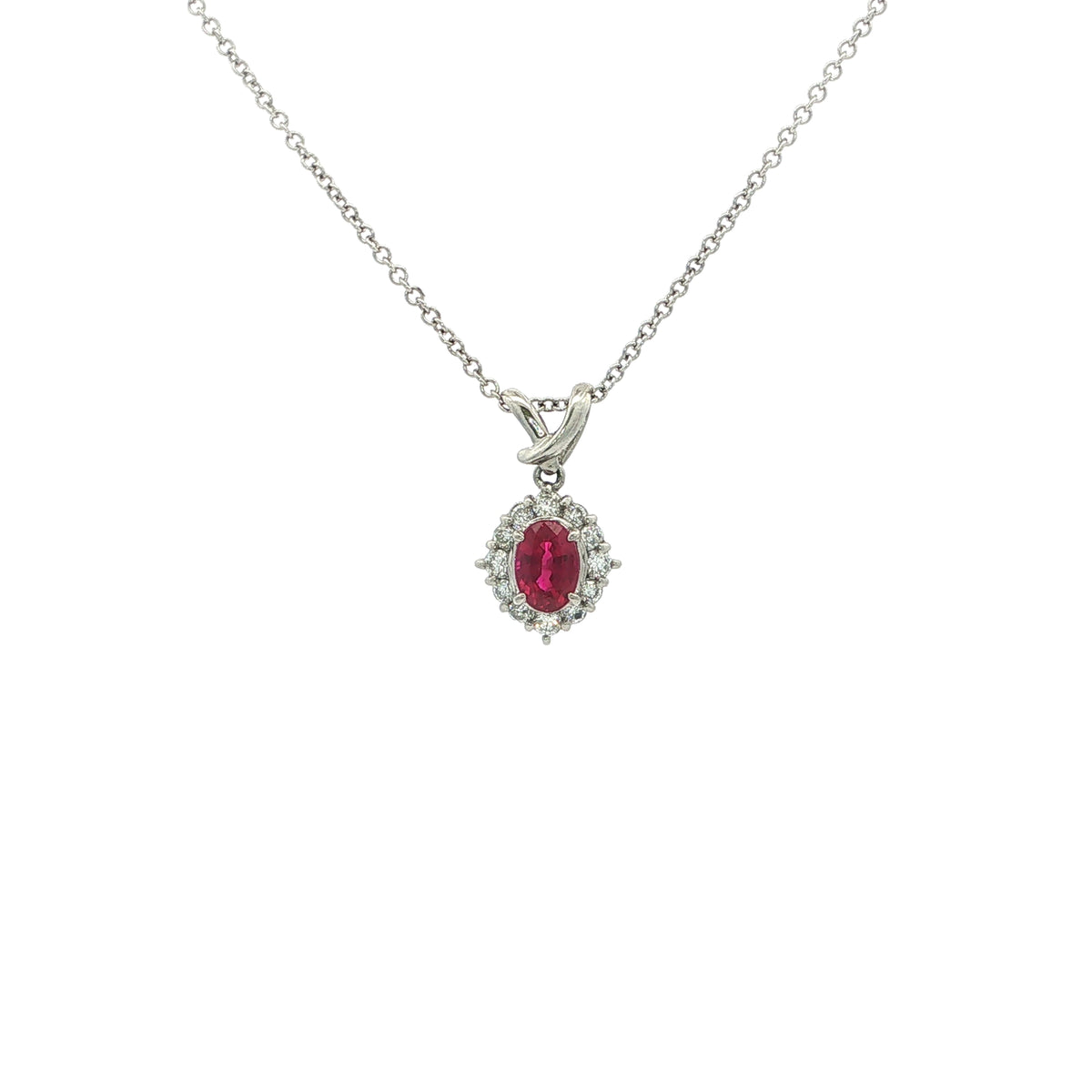 Vintage Oval Ruby And Natural Diamond Cluster Pendant Set In Platinum