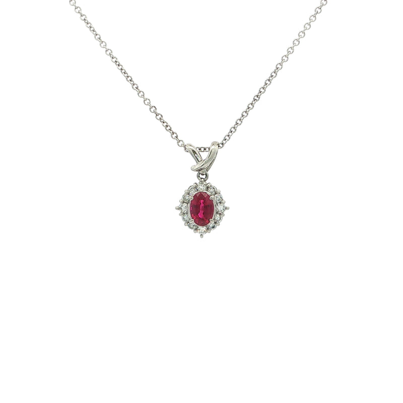 Vintage Oval Ruby And Natural Diamond Cluster Pendant Set In Platinum