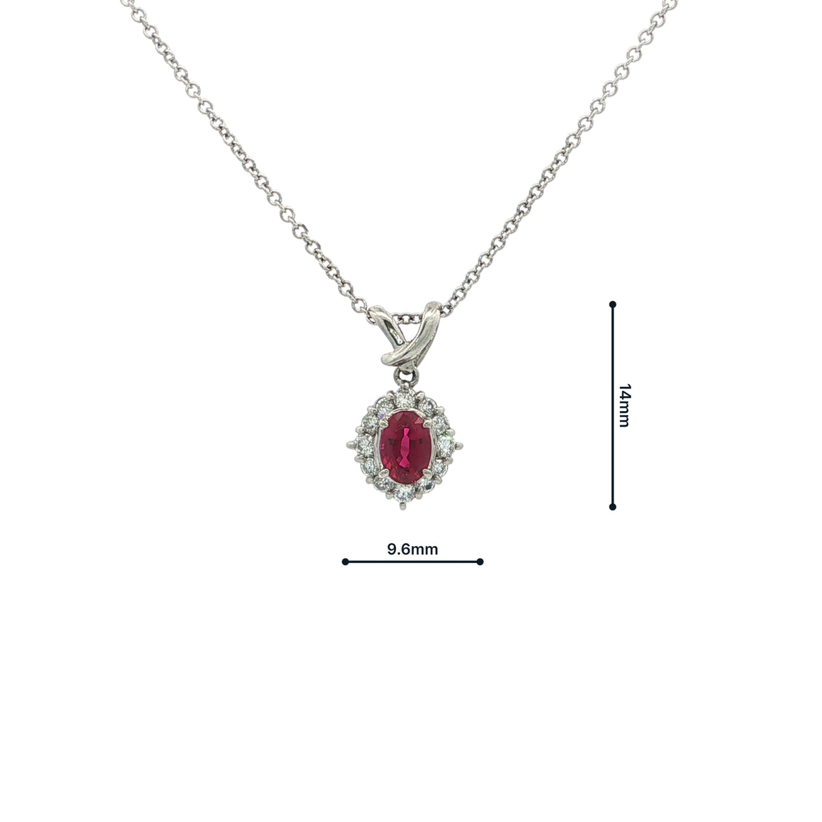 Vintage Oval Ruby And Natural Diamond Cluster Pendant Set In Platinum