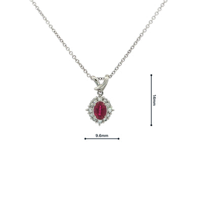 Vintage Oval Ruby And Natural Diamond Cluster Pendant Set In Platinum