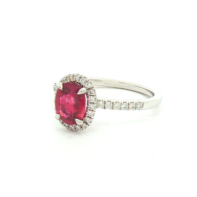 1.25ct Oval Ruby With 0.20ct Natural Diamond Halo & Shoulders in 18ct White Gold