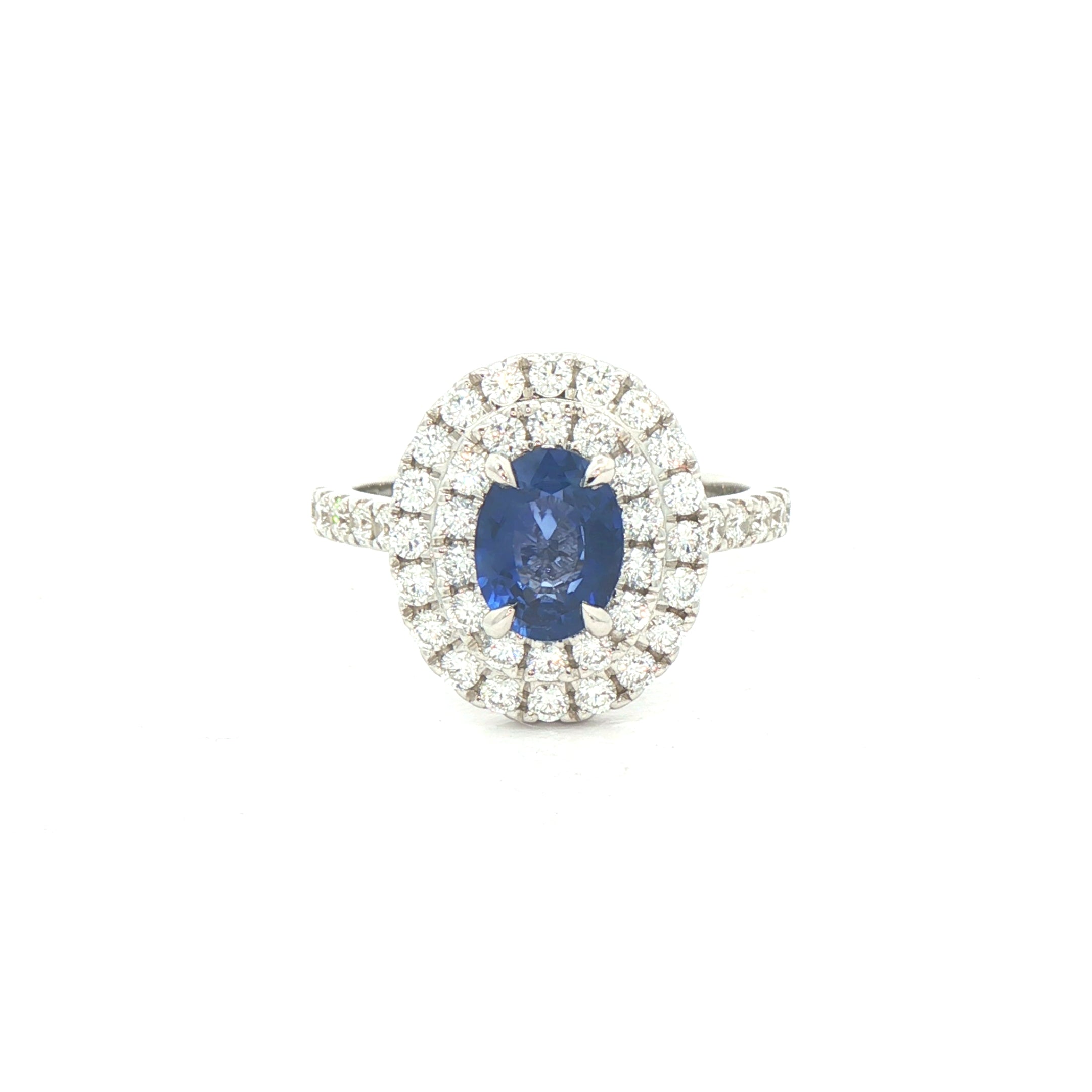 18ct White Gold Oval Sapphire & Natural Diamond Halo Ring
