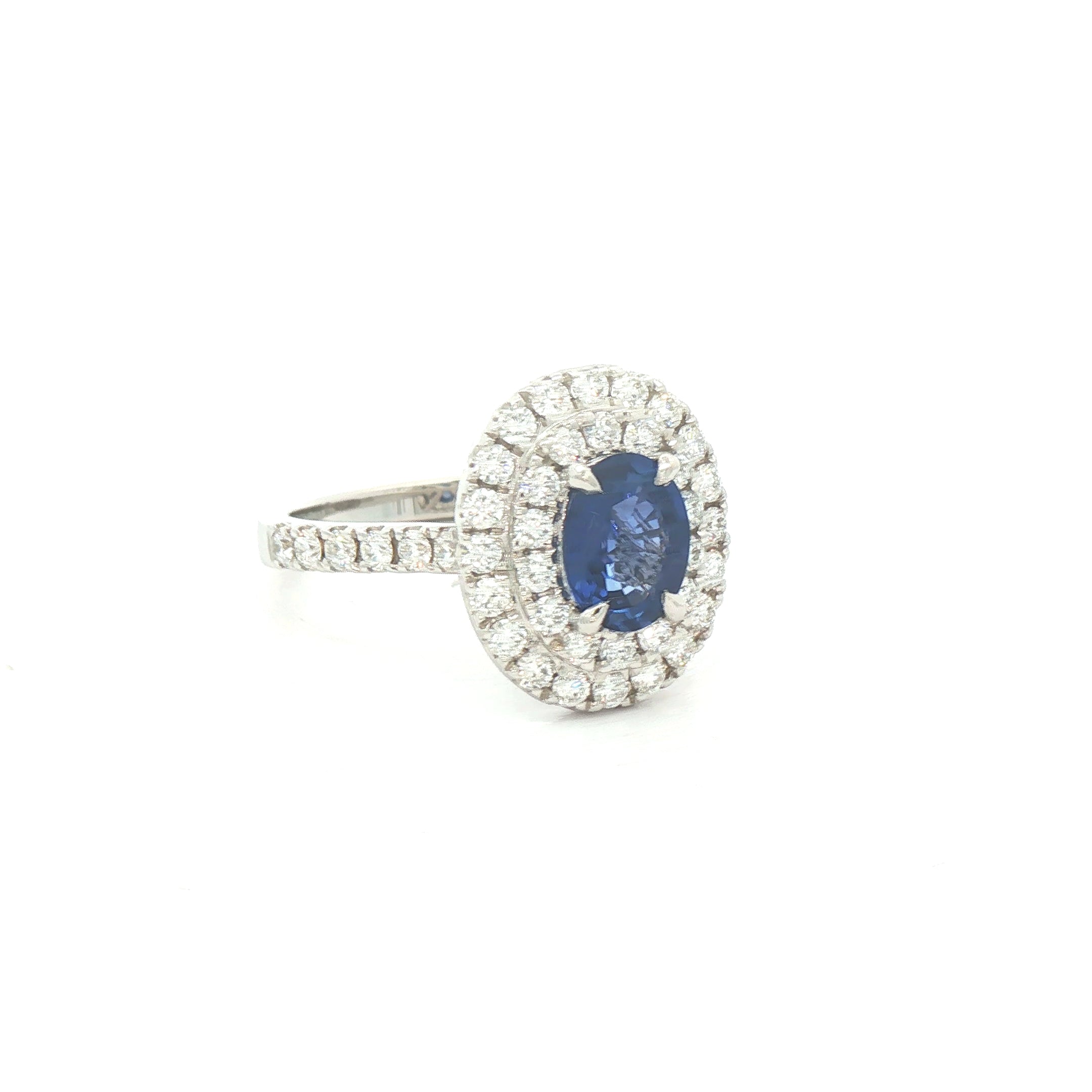 18ct White Gold Oval Sapphire & Natural Diamond Halo Ring