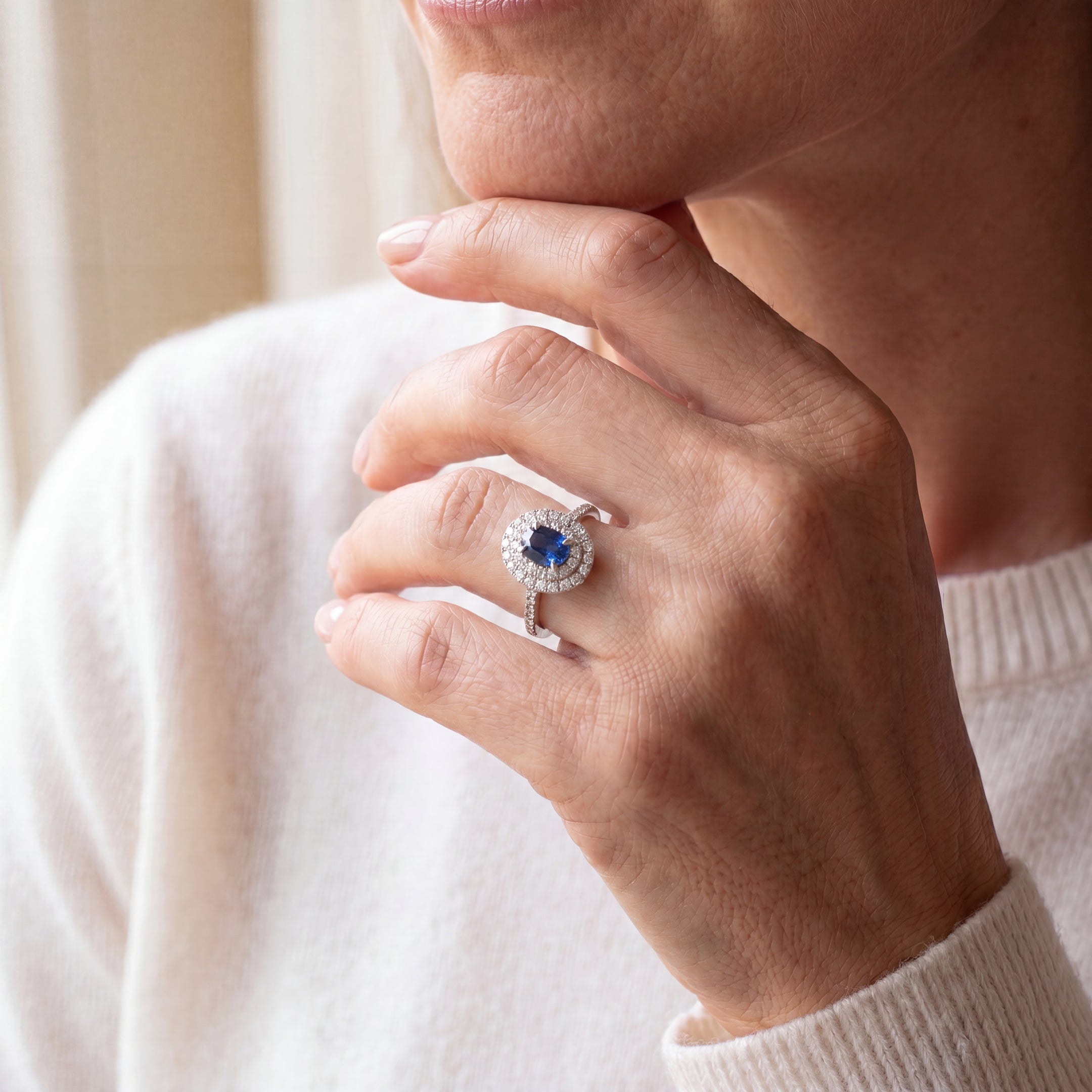 18ct White Gold Oval Sapphire & Natural Diamond Halo Ring