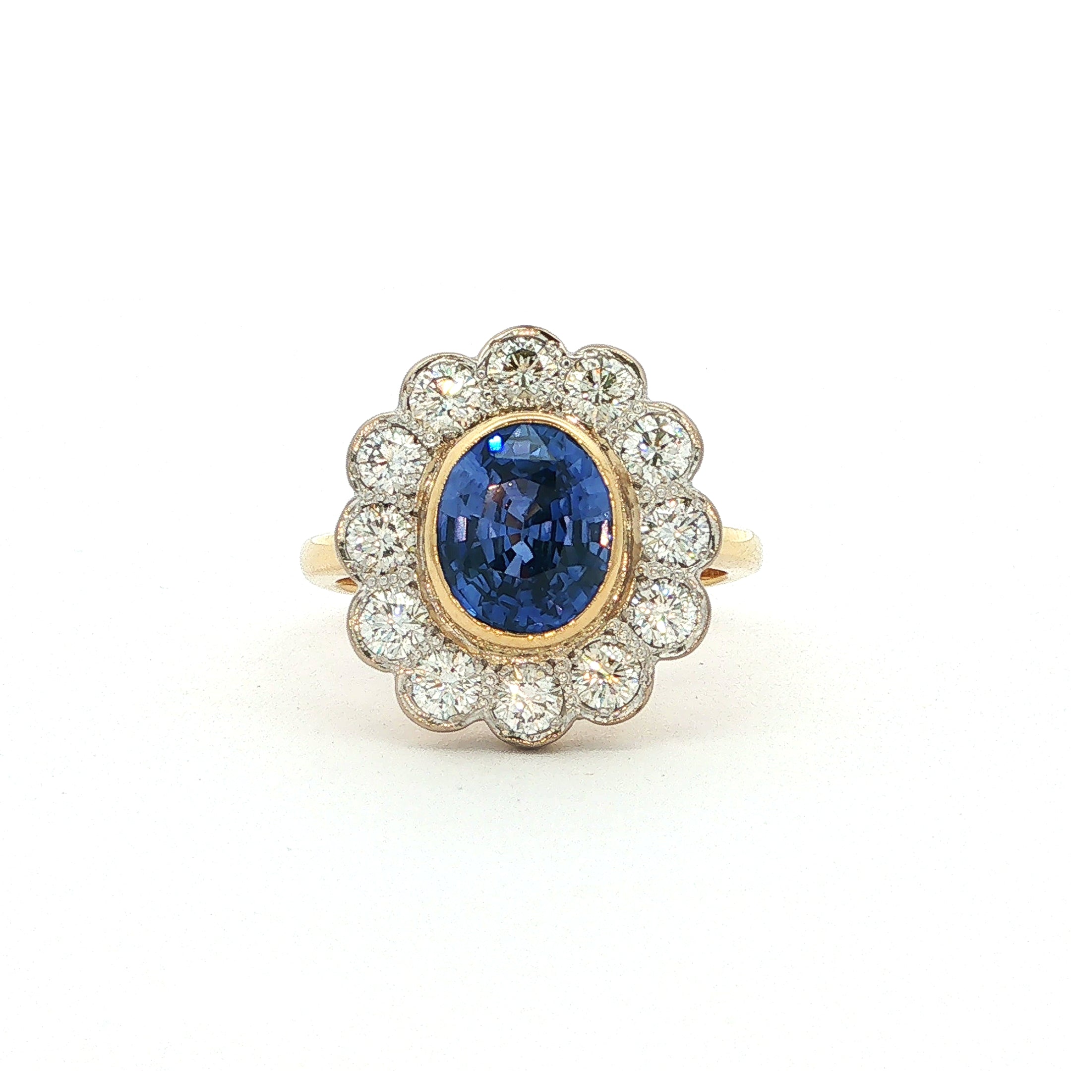 2.72ct Natural Sapphire & 0.96ct Natural Diamond Vintage Oval Cluster Vintage Ring set in 18ct Yellow Gold