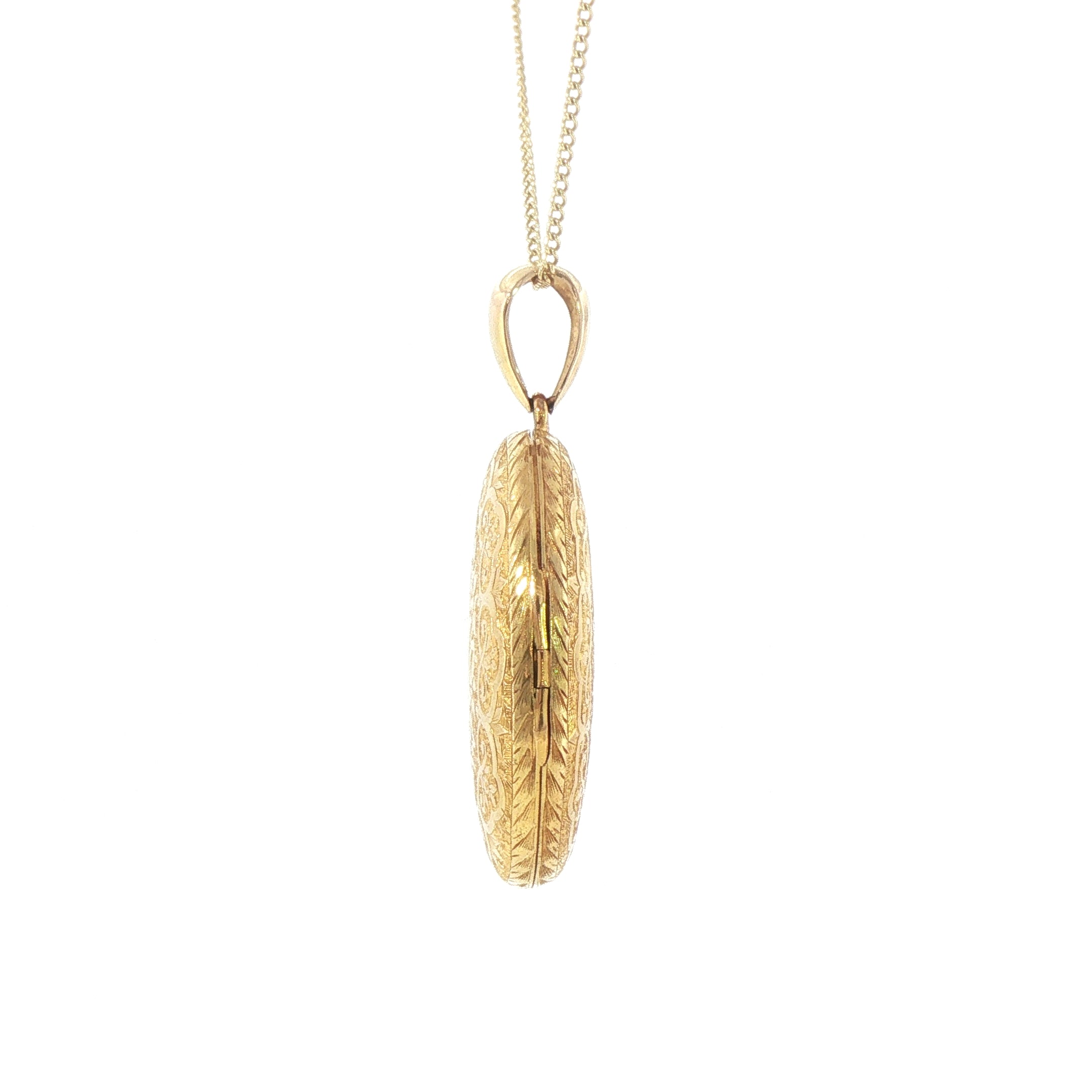 Large Oval Ornate Motif Locket Weighing a Total 13.7g in 15ct Yellow Gold