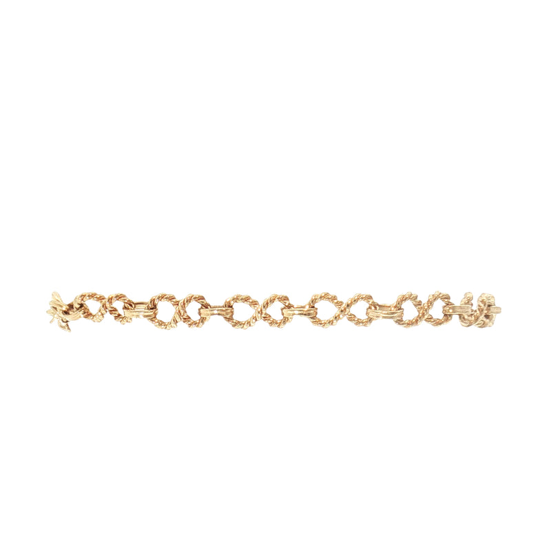 Ladies Infinity Style Knot Solid Link Bracelet Weighing 7.5g in 9ct Yellow Gold