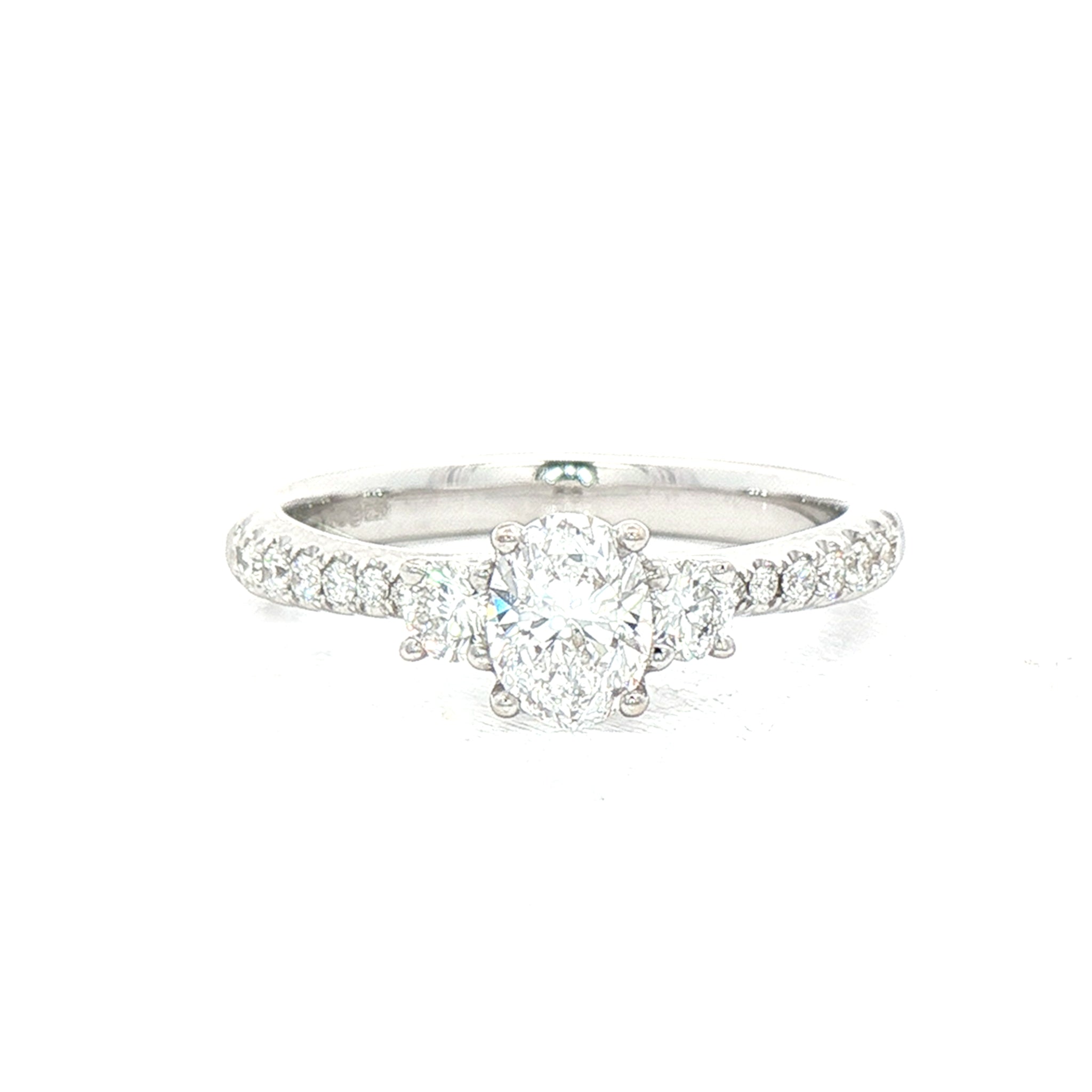 C0.50ct S0.30ct Natural Diamond Oval And Round Brilliant Three Stone Set In 18ct White Gold