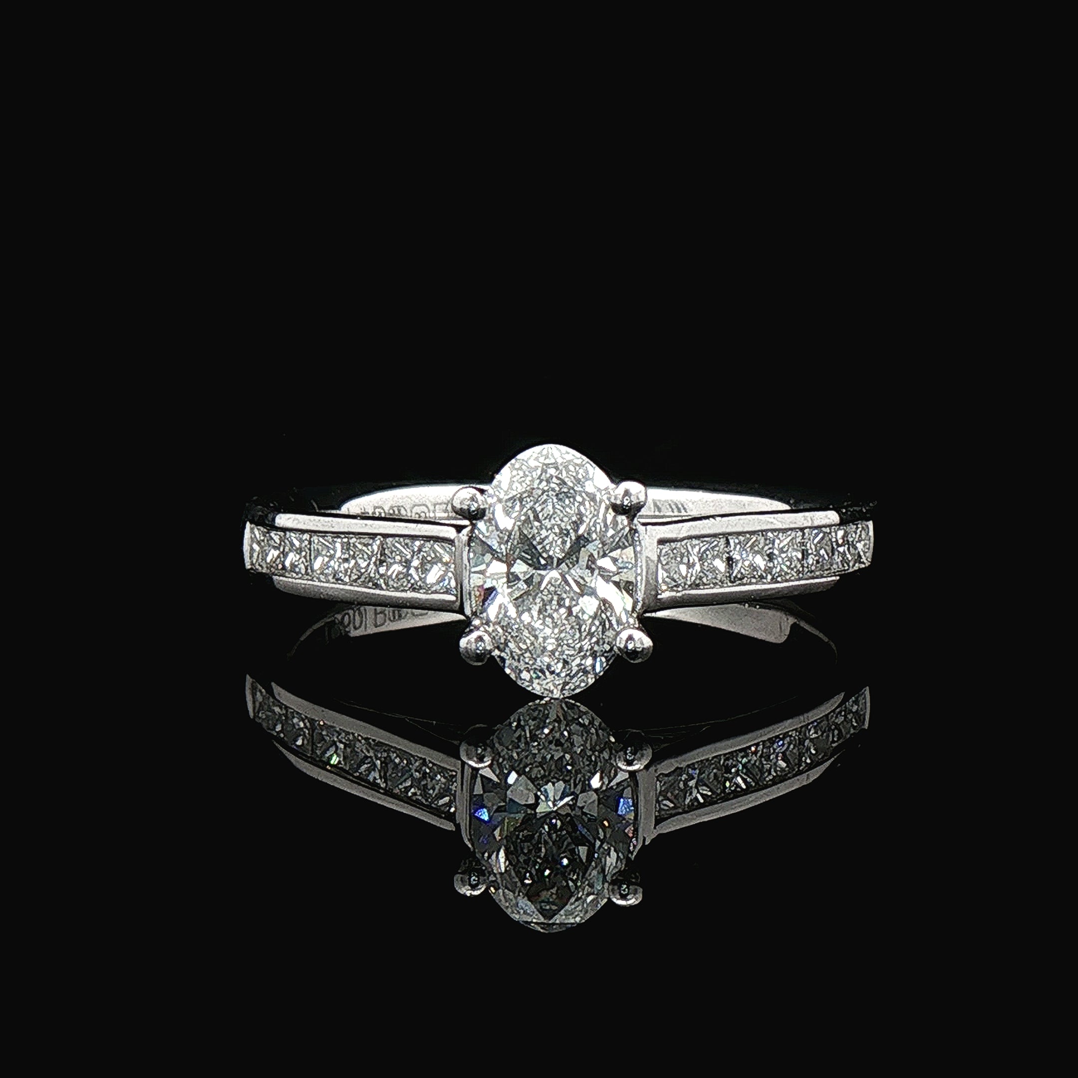 0.78ct D VS2 GIA Certified Oval Solitaire With Princess Cut Shoulders Platinum Engagement Ring