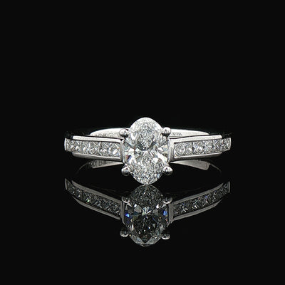 0.78ct D VS2 GIA Certified Oval Solitaire With Princess Cut Shoulders Platinum Engagement Ring