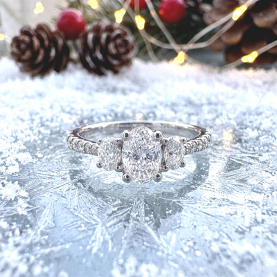 C0.70ct S0.55 D vs2 Certified Oval Natural Diamond With Round Sides & Shoulders Set In Platinum