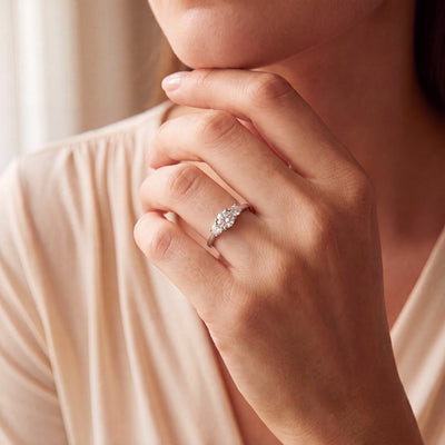 C0.70ct S0.36ct E vs2 Brilliant Cut Three Stone Diamond Ring Set In Platinum
