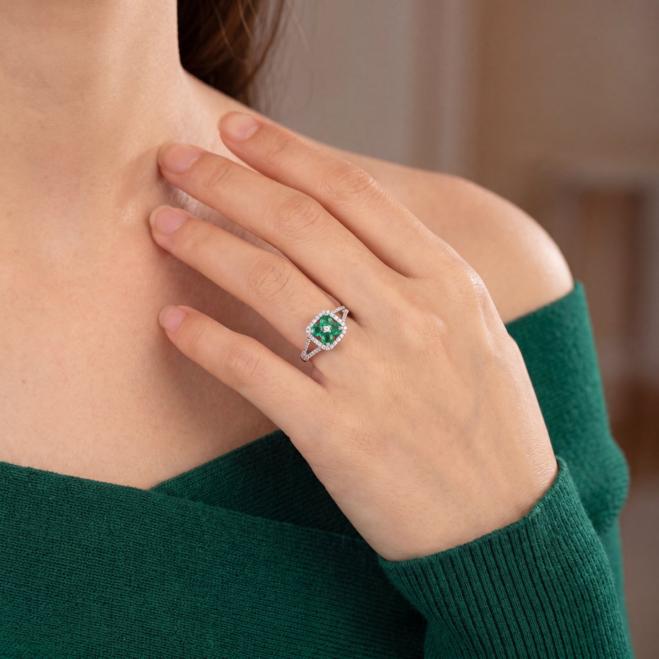 0.60ct Emerald and 0.45ct Diamond Dress Ring with Split Diamond Band