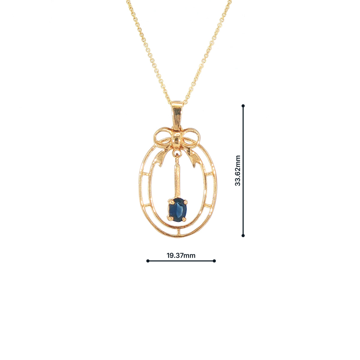 Vintage-Inspired Bow Pendant with Royal Blue Sapphire Set in 9ct Gold