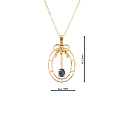 Vintage-Inspired Bow Pendant with Royal Blue Sapphire Set in 9ct Gold