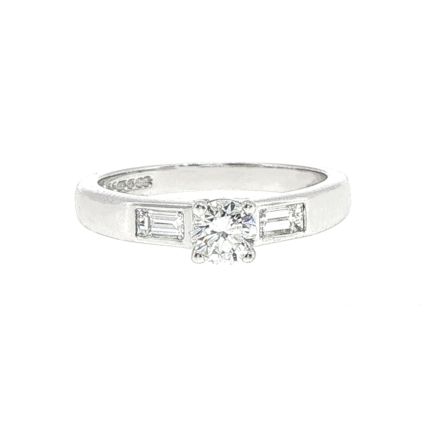 0.59ct Round Cut Natural Diamond Solitaire With Baguette Side Diamonds Set In 18ct White Gold