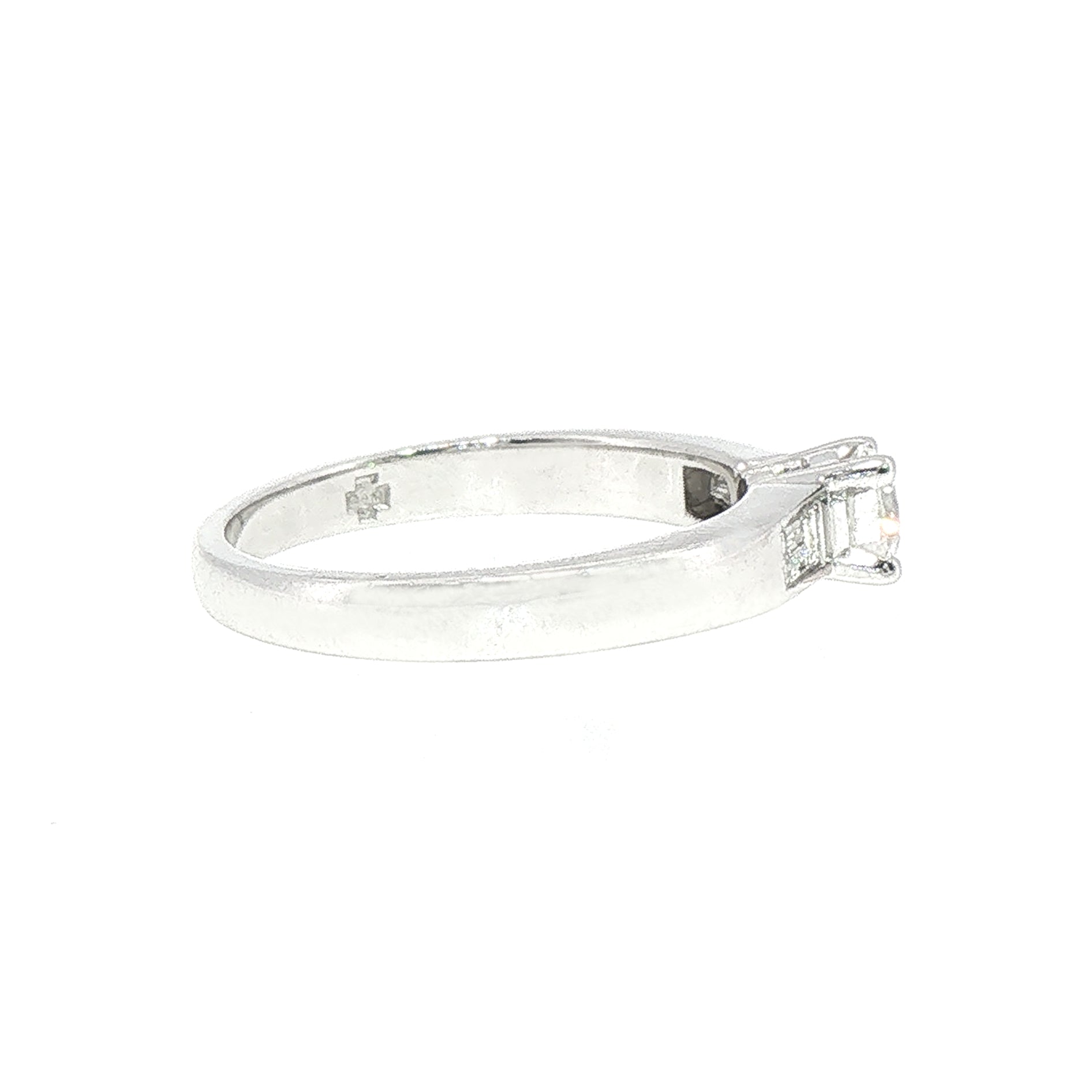 0.59ct Round Cut Natural Diamond Solitaire With Baguette Side Diamonds Set In 18ct White Gold