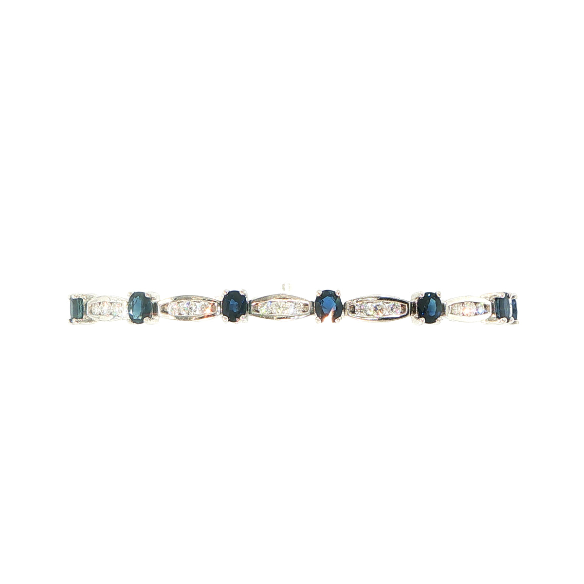 5.85ct Oval Sapphire & 2.08ct Natural Diamond Bracelet Weighing 28.3g in Platinum