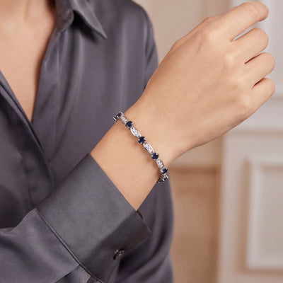 5.85ct Oval Sapphire and 2.08ct Natural Diamond Bracelet Weighing 28.3g in Platinum
