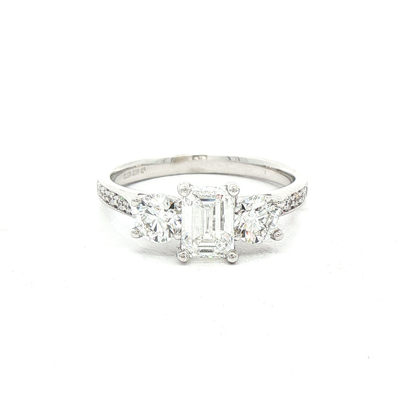 C0.73ct S0.56ct Natural Diamond Emerald & Brilliant Cut Three Stone Ring Set In 18ct White Gold