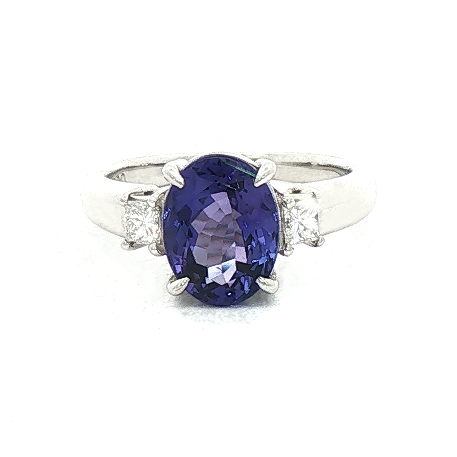 2.66ct Oval Tanzanite & 0.20ct Princess Cut Natural Diamond Sides in Platinum