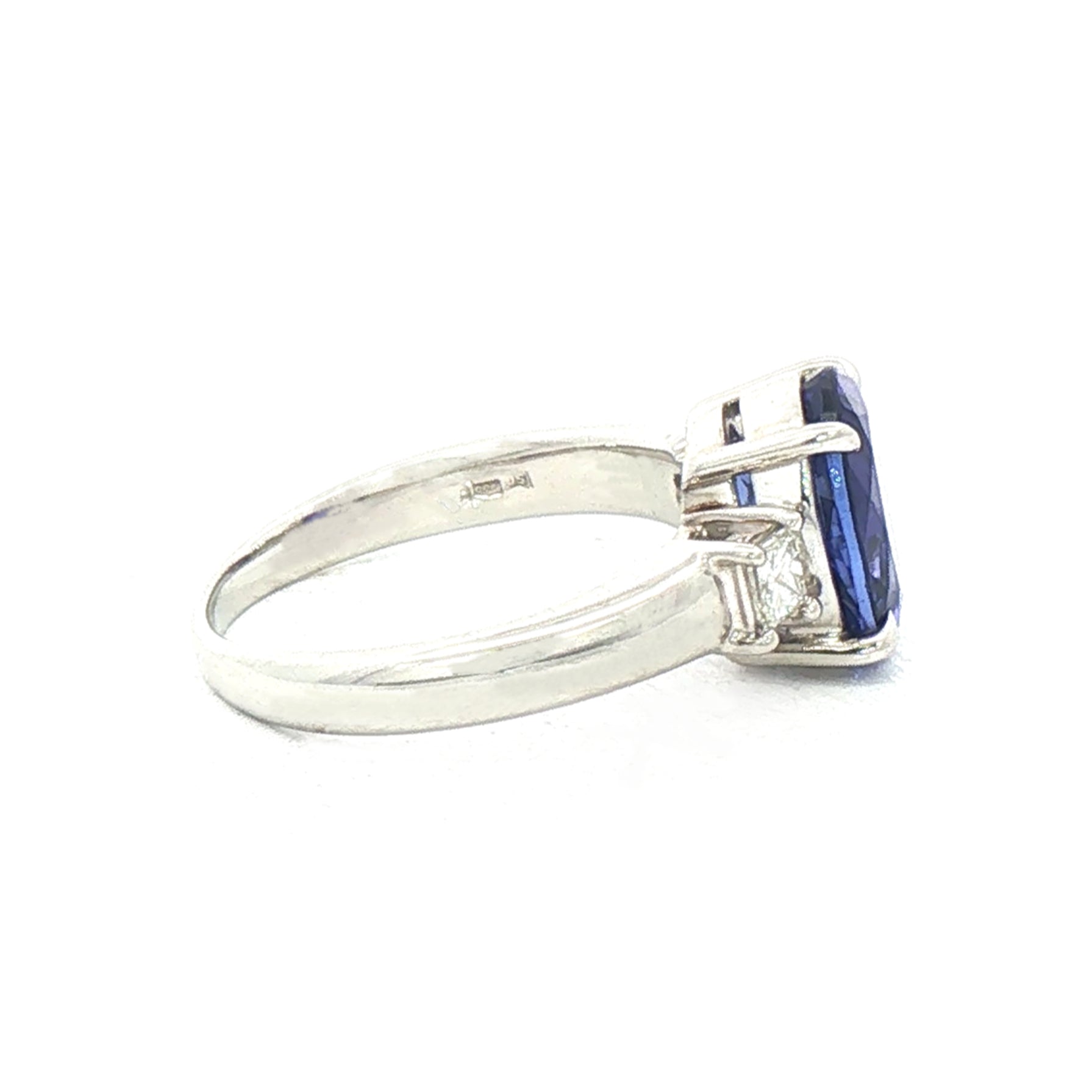 2.66ct Oval Tanzanite & 0.20ct Princess Cut Natural Diamond Sides in Platinum