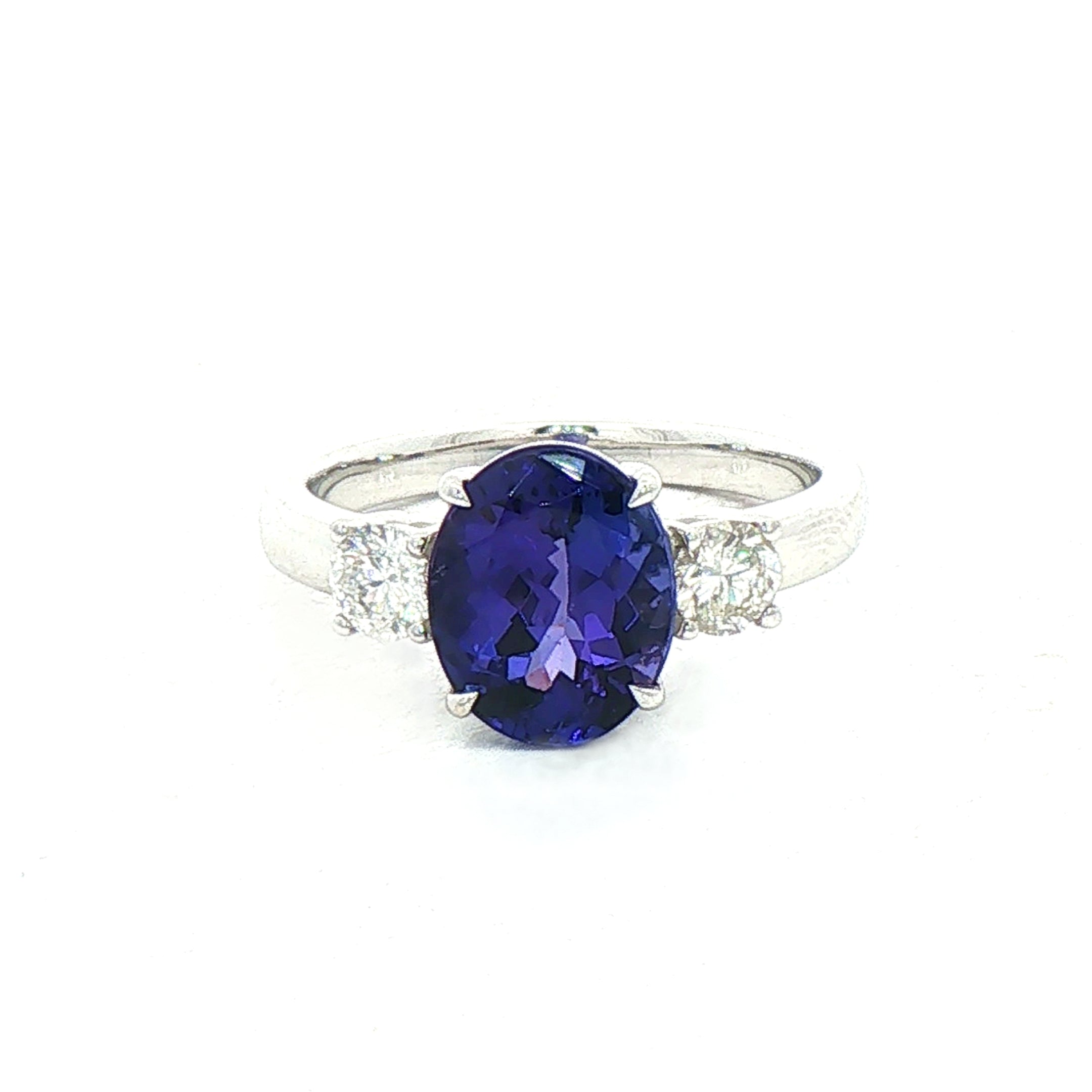 2.60ct Oval Tanzanite & 0.45ct Natural Diamond Round Cut Sides in 18ct White Gold