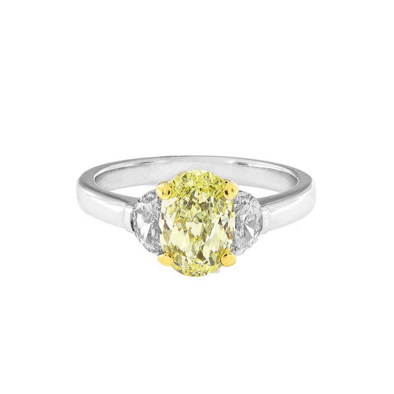 Ladies Platinum Fancy Natural Yellow Oval Natural Diamond 2.00ct and Crescent cut side diamonds 0.60ct