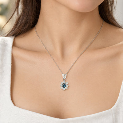 Vintage Oval Sapphire and Natural Diamond Cluster Pendant and Chain in Platinum