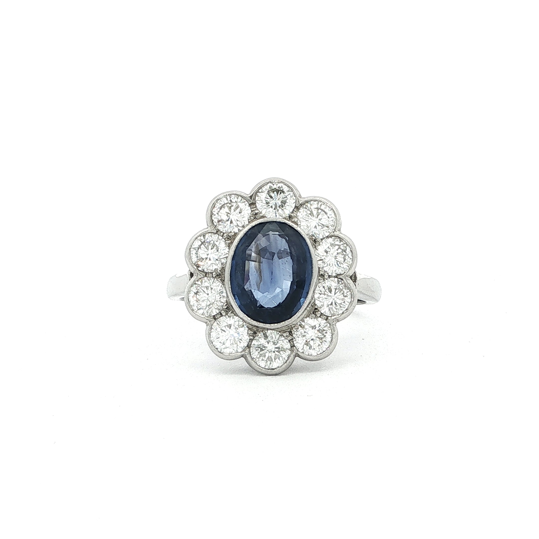 2.07ct Oval Sapphire & Natural Diamond Cluster 1.60ct Set in 18ct White Gold
