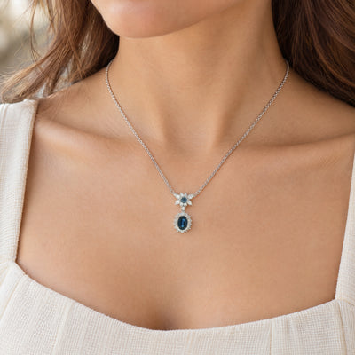 Vintage Oval Sapphire and Natural Diamond Cluster Pendant and Chain in Platinum