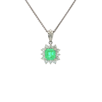 Vintage Emerald And Diamond Cluster Pendant Set In Platinum.