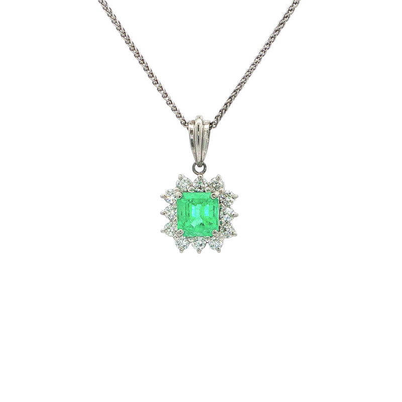 Vintage Emerald And Diamond Cluster Pendant Set In Platinum.