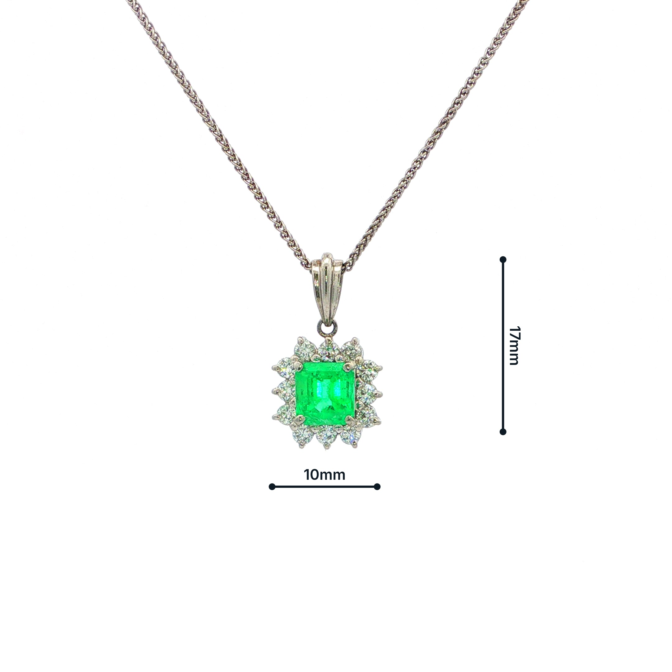 Vintage Emerald And Diamond Cluster Pendant Set In Platinum.