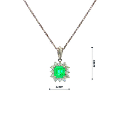 Vintage Emerald And Diamond Cluster Pendant Set In Platinum.