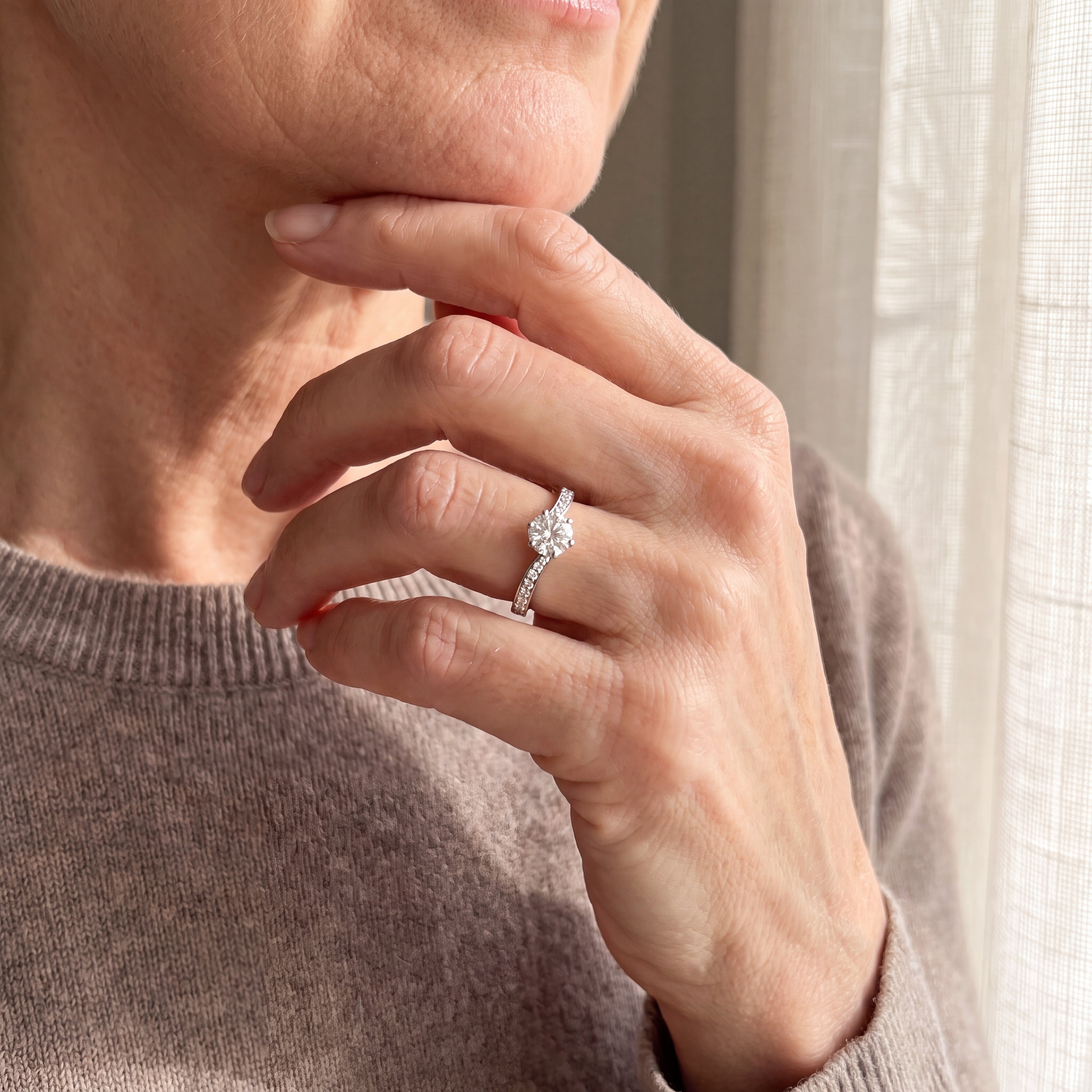 0.57ct Fsi1 Natural Diamond Solitaire Engagement Ring With Shoulder Diamonds Set In 18ct White Gold.