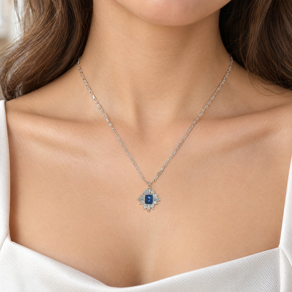 Vintage Emerald Cut Sapphire and Natural Diamond and Mixed Diamond Cluster Pendant in Platinum