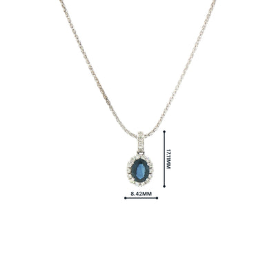 Vintage Oval Sapphire and Natural Diamond Halo Pendant 18ct White Gold