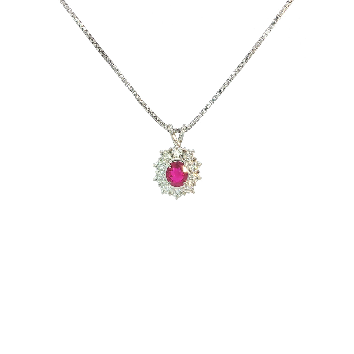 Vintage Oval Ruby And Natural Diamond Pendant Set In Platinum