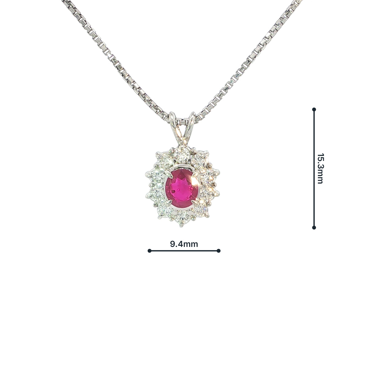 Vintage Oval Ruby And Natural Diamond Pendant Set In Platinum