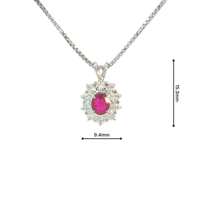 Vintage Oval Ruby And Natural Diamond Pendant Set In Platinum