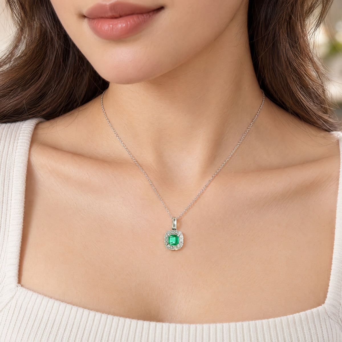 Vintage 0.73ct Emerald and Natural Diamond Halo Pendant in 18ct White Gold
