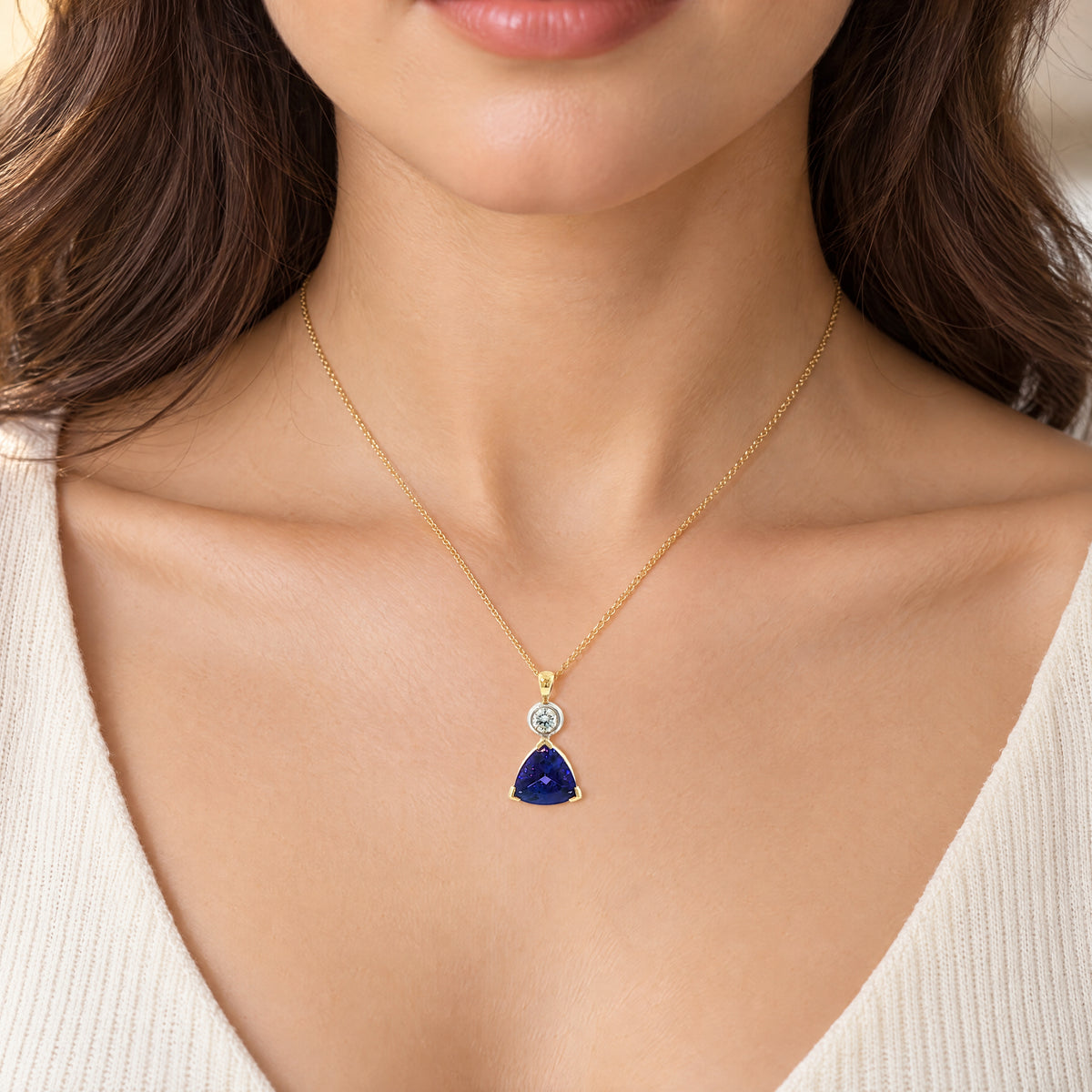Vintage Tanzanite and Natural Diamond Pendant and Chain in 18ct Yellow Gold