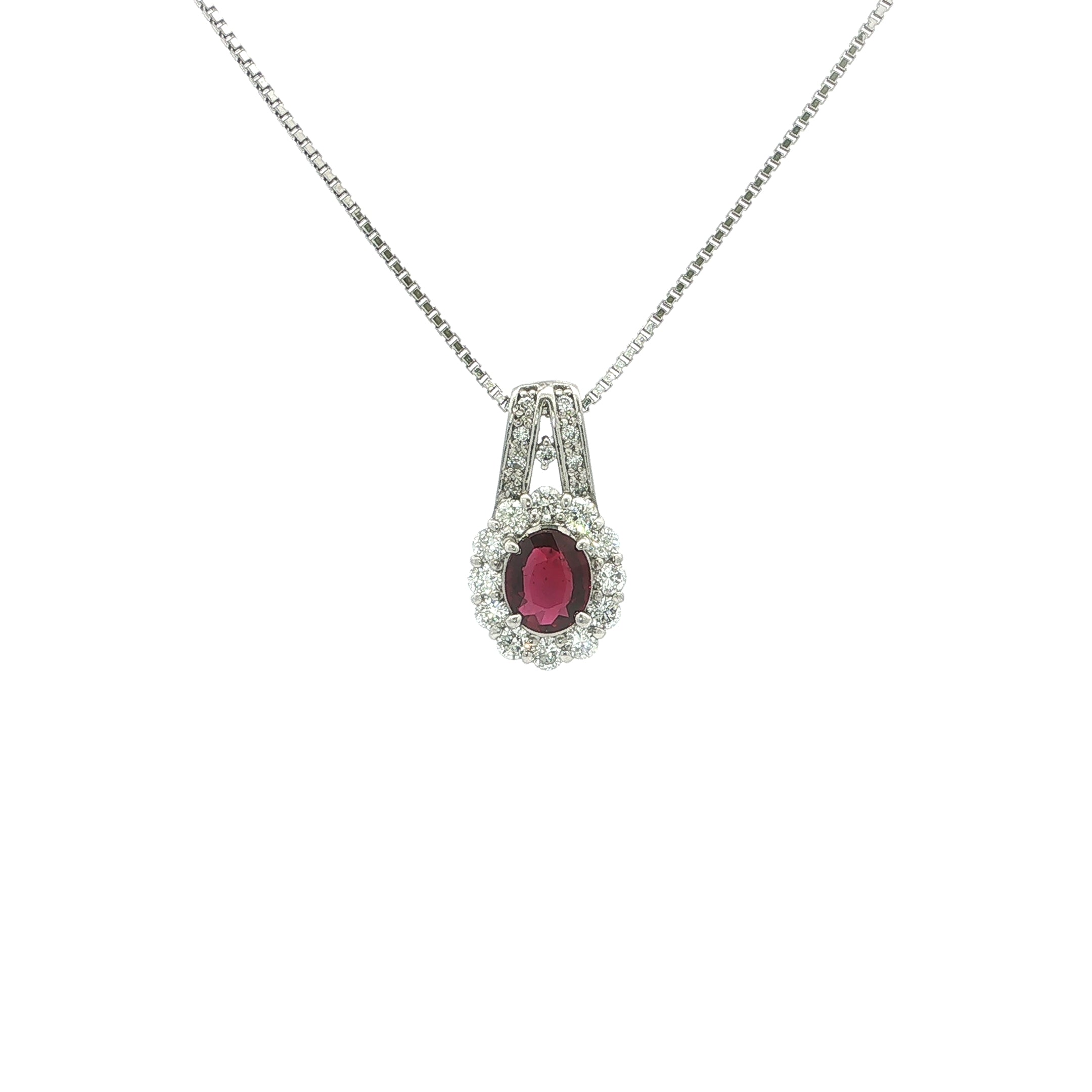 Vintage Oval Ruby And Natural Diamond Cluster Pendant Set In Platinum