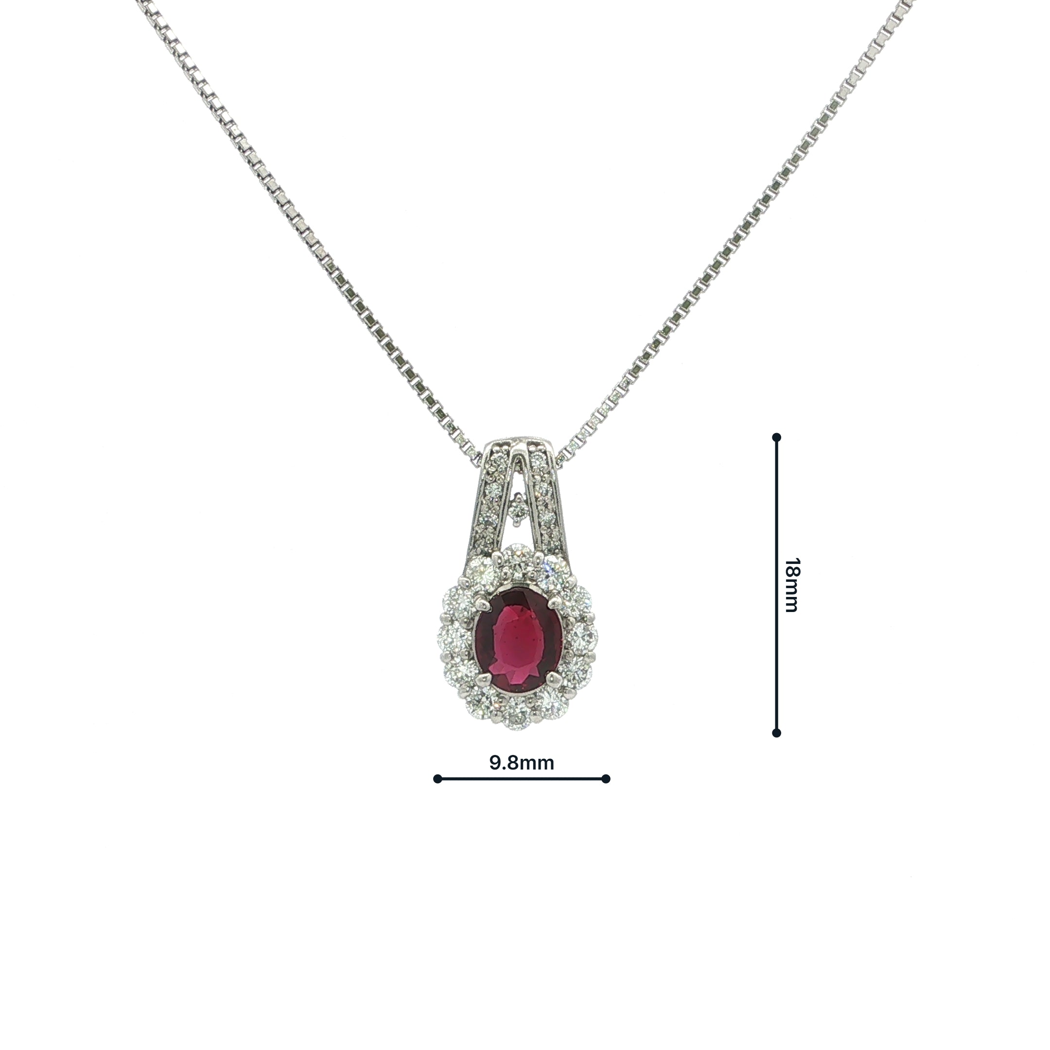 Vintage Oval Ruby And Natural Diamond Cluster Pendant Set In Platinum