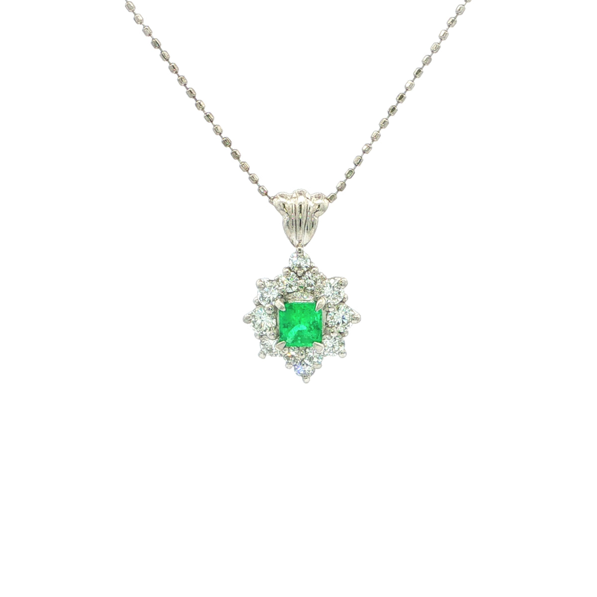 Vintage Emerald And Natural Diamond Cluster Pendant Set In Platinum