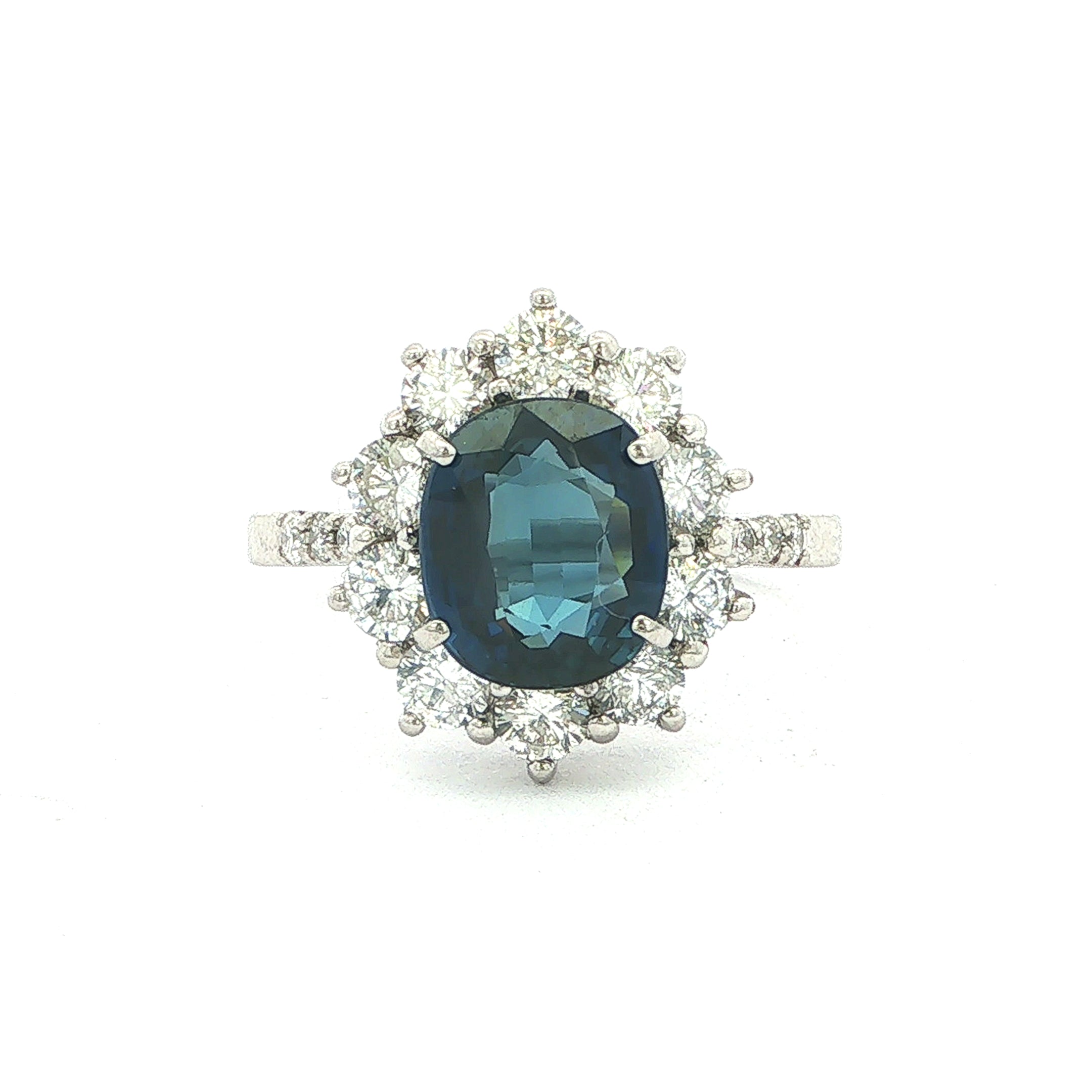 Vintage Deep Royal Blue Sapphire and Natural Diamond Halo Cluster Ring in Platinum