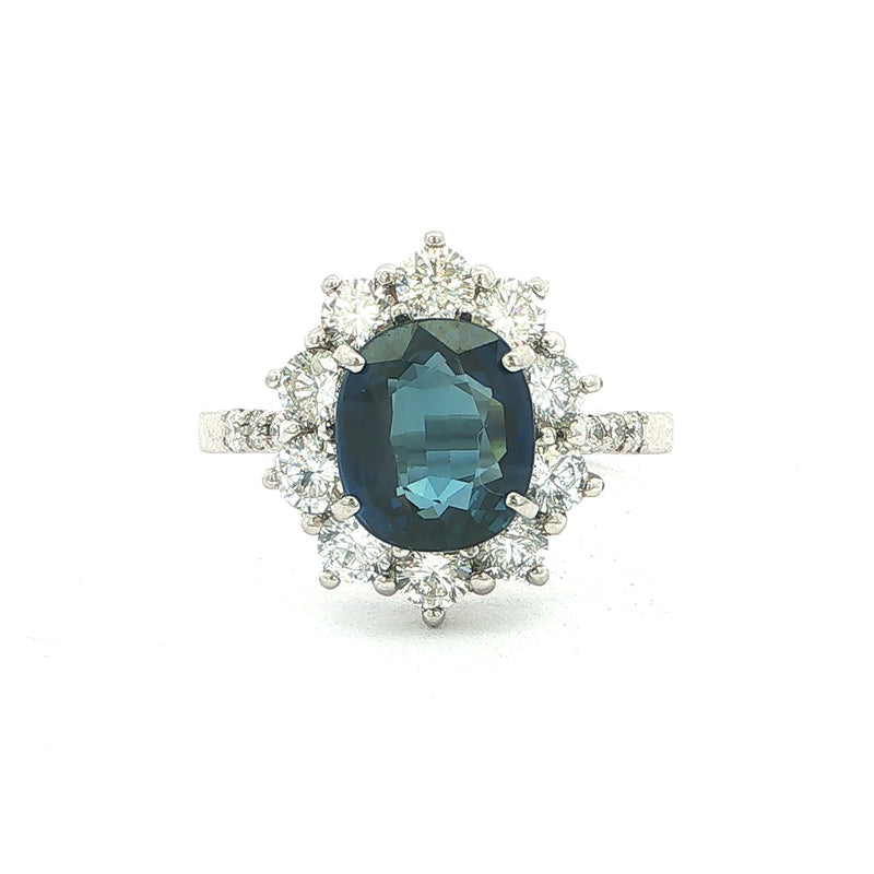 Vintage Deep Royal Blue Sapphire and Natural Diamond Halo Cluster Ring in Platinum